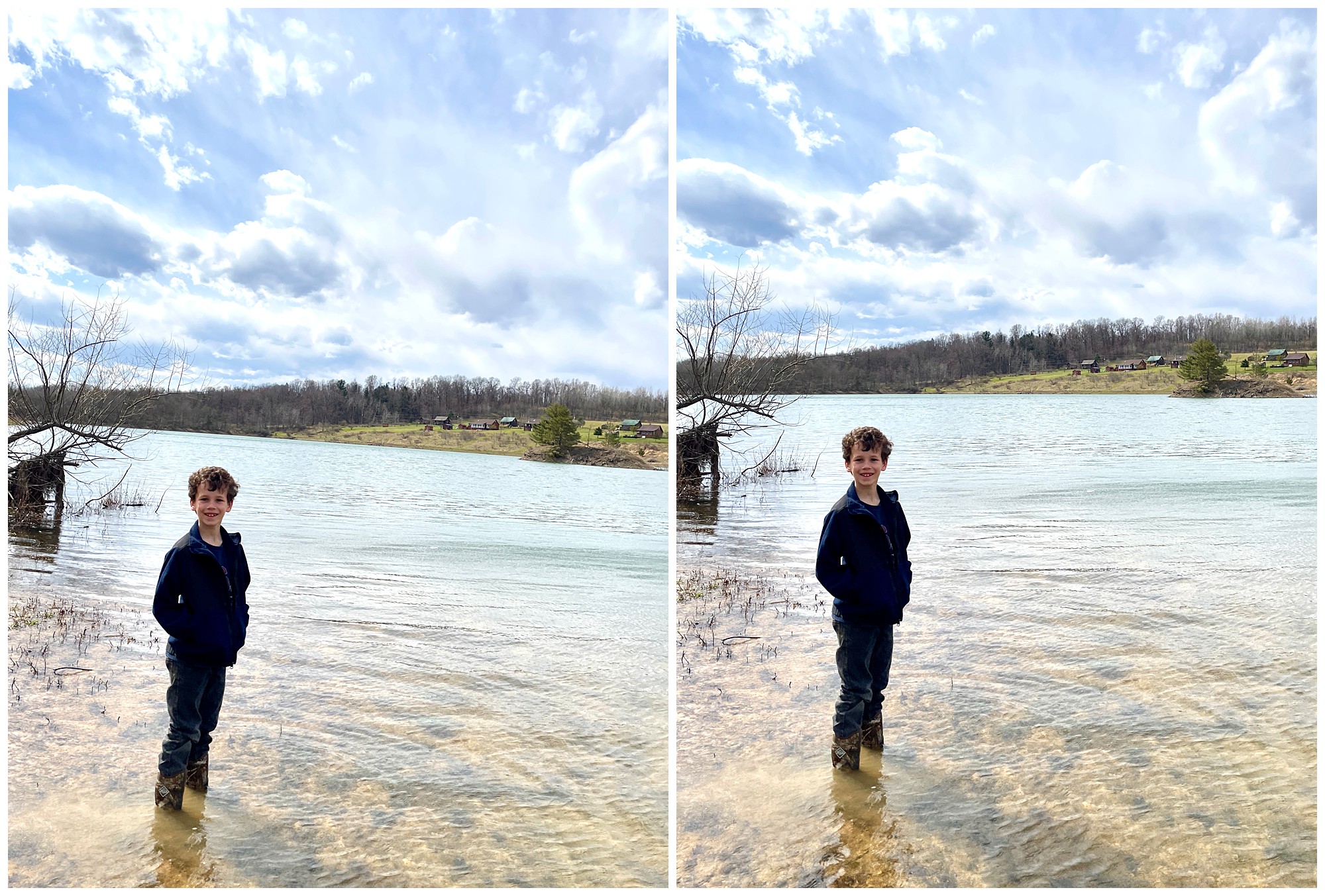 Young boy standing in a lake with water up to his shins.